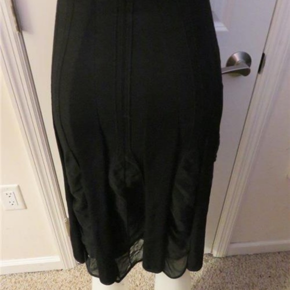 D. EXTERIOR BLACK PLEATED SKIRT SIZE SMALL - Picture 4 of 7